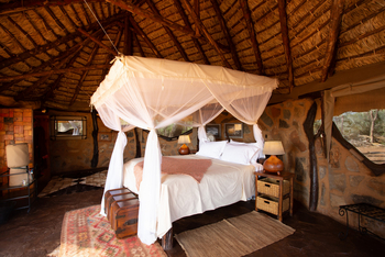 Saruni Rhino Camp: Doppelbett mit Moskitonetz Banda 1