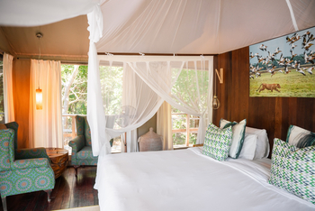 Muzimu Lodge: Wildtierfotos über dem Bett