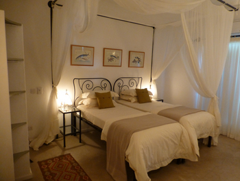 The River Farmhouse The River Farmhouse: Einzelbetten mit Fisch-Deko