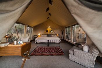 Little Machaba Camp: Teppich vor dem Bett