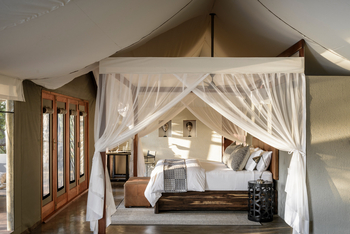 Sungani Lodge Sungani Lodge: Bett mit Moskitonetz