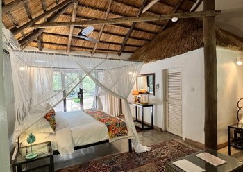 Waterberry Zambezi Lodge: Teppiche im Cottage