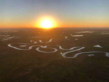 Guma Lagoon Camp: Sonnenuntergang über dem Okavango