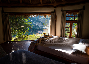 Borana Lodge Borana Lodge: Lichteinfall ins Schlafzimmer Cottage 5