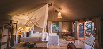 Camp Xakanaxa Camp Xakanaxa: Familienzimmer mit Doppelbett und Veranda