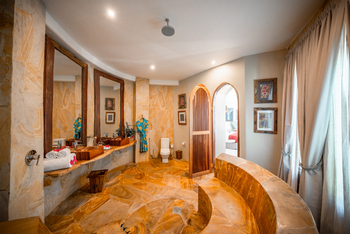 Xanadu Villas: Badezimmer Mawimbi Villa