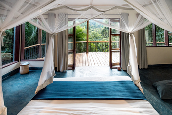 Turaco Treetops: Bett mit Blick