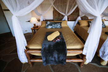 Huab Lodge: Einzelbett mit Moskitonetz