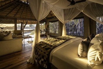 Savuti Camp Savuti Camp: Doppelbett mit Moskitonet