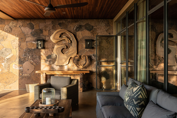 Singita Kilima: Veranda einer Suite