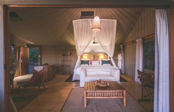 Camp Xakanaxa Camp Xakanaxa: Familienzimmer am Abend