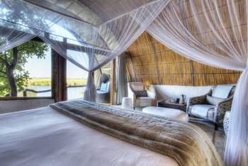 Okuti Camp: Bett und Sessel