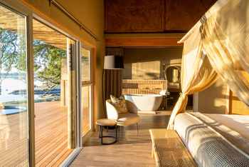 Victoria Falls River Lodge Victoria Falls River Lodge: Villa - Bad und Bett