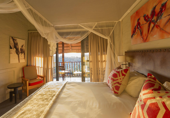 Victoria Falls Safari Lodge Victoria Falls Safari Lodge: Bett mit Moskitonetz