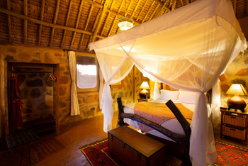 Saruni Rhino Camp: Doppelbett mit Moskitonetz Banda 3