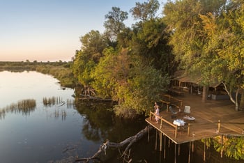 Xugana Island Lodge: Lounge mit Feuerstelle