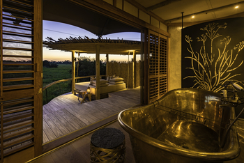 Mombo Camp: Badewanne und Tagesbett