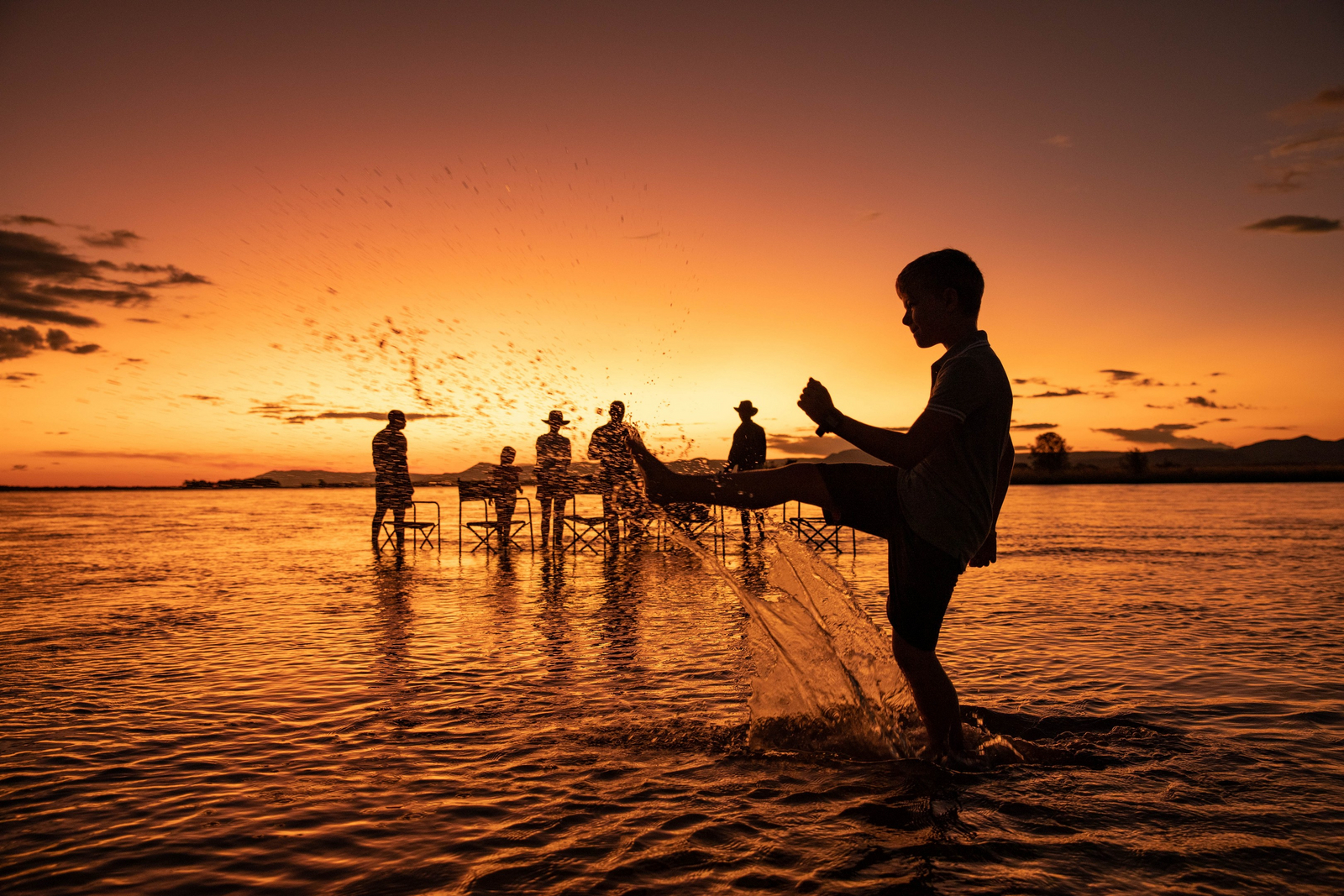 Tembo Plains Camp Tembo Plains Camp: Wasserspaß bei Sonnenuntergang