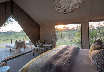 Gomoti Private Camp Gomoti Private Camp: Bett und Veranda