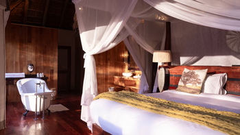 Gham Dhao Lodge Gham Dhao Lodge: Bett und Badewanne