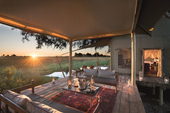 Duba Plains Camp: Sonnenuntergang am privaten Deck