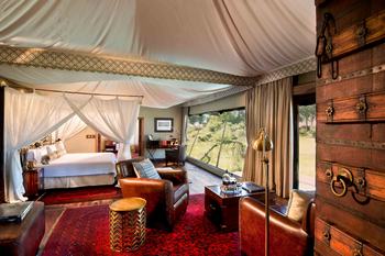 Duba Plains Camp: Doppelbett und Teppiche