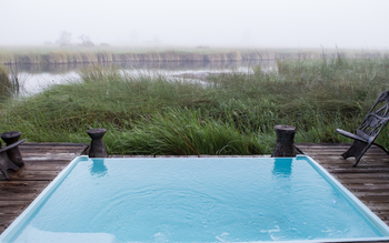 Camp Xakanaxa Camp Xakanaxa: Pool mit Blick auf den Fluss