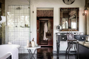 Singita Ebony Lodge: Gästebad und Ankleide