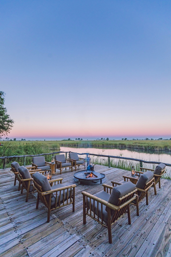 Camp Xakanaxa Camp Xakanaxa: Feuerstelle und Blick auf den Fluss