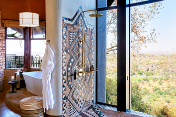 Singita Malilangwe House: Gekachelte Dusche