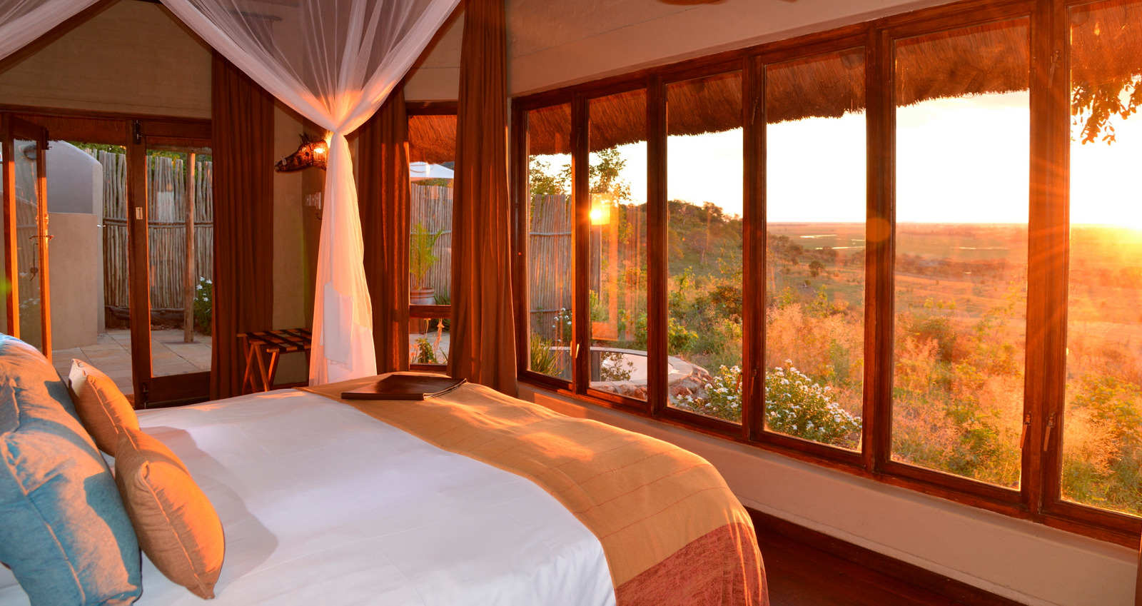 Ngoma Safari Lodge Ngoma Safari Lodge: Panoramafenster einer Suite