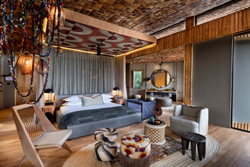 andBeyond Grumeti Serengeti River Lodge: Babybeistellbett