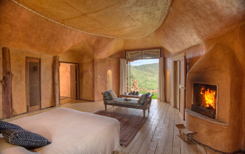 Borana Lodge Borana Lodge: Schlafzimmer mit offenem Kamin Cottage 7