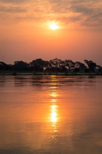 Ruckomechi Camp: Sonnenuntergang Fluss