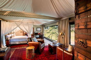 Duba Plains Camp: Doppelbett und Teppiche