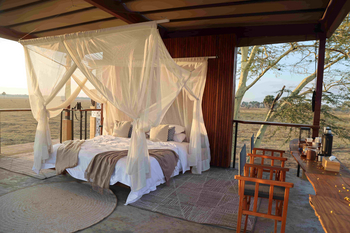 Lion House Sleep-out: Freiluft-Schlafzimmer mit Moskitonetz
