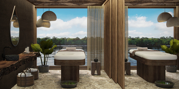 andBeyond Amazon Explorer: Zwei Massageliegen mit Blick auf Dschungelfluss