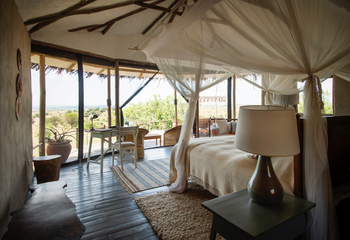 Mkombe's House Lamai: Doppelbett mit Moskitonetz