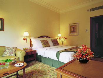 The Oberoi Udaivilas: Doppelbett und Blumen