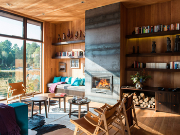 andBeyond Vira Vira Lodge: Kamin in der Bibliothek