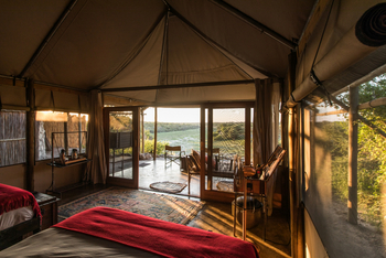 Meno A Kwena Camp Meno A Kwena Camp: Innenbereich der Doppelzimmer mit Veranda