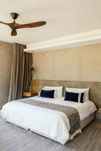 Cheetah Plains Mvula House: Doppelbett in einer Suite