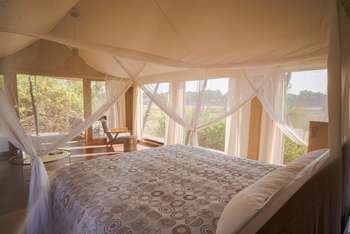 Chikunto Safari Lodge Chikunto Safari Lodge: Doppelbett und Moskitonetz