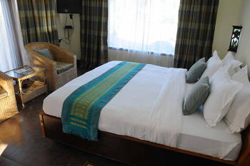 Musa Jungle Retreat Musa Jungle Retreat: Grazing Rhino Room