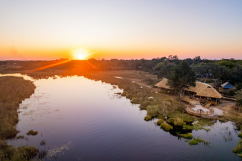 4 Rivers Camp 4 Rivers Camp: Luftbild - Untergehende Sonne